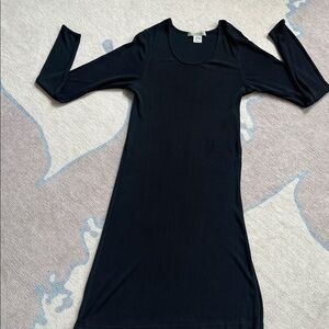 Underwriters Black silk long sleeve dress. Slight flaw as seen in 3rd picture.